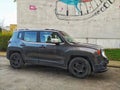 Black small 4WD car Jeep Renegade parked