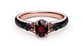 Elegant black ring with a red gemstone on a white isolated background Royalty Free Stock Photo