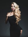 Elegant blonde on black background