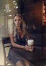 Elegant blonde woman drinking coffee Royalty Free Stock Photo