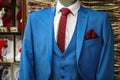 Elegant blue business suit on mannequin in front of the clothing store Royalty Free Stock Photo