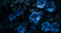 Elegant blue flowers in a dark moody garden