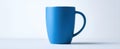 The elegant blue mug standing on a clean minimalist background..AI generated image Royalty Free Stock Photo
