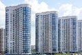 Tall houses of white-blue high-rise buildings in a new district of the city Royalty Free Stock Photo