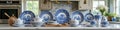 Elegant blue and white tableware collection in bright kitchen setting Royalty Free Stock Photo