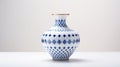 Elegant Blue And White Vase With Intricate Geometric Patterns
