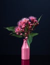 Elegant bouquet of vivid pink Eucalyptus flowers in a pink vase