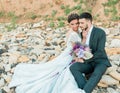 Bride and groom at wedding ceremony near sea Royalty Free Stock Photo