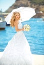 Elegant bride outdoor wedding portrait. Beautiful fiancee woman