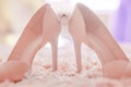 Elegant bride shoes, diamond wedding ring, beautiful wedding arrangement Royalty Free Stock Photo