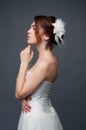 Elegant bride with short hair updo and bare shoulders dress