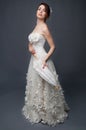Elegant bride with short hair updo and bare shoulders dress