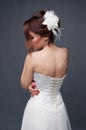 Elegant bride with short hair updo and bare shoulders dress