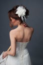 Elegant bride with short hair updo and bare shoulders dress