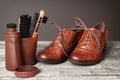 Elegant brown shoes and shoes cleaning kit