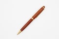 Elegant business brown and gold wood ballpoint pen Royalty Free Stock Photo