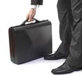 Elegant business man in suit holding briefcase Royalty Free Stock Photo