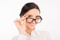 Elegant business woman adjusts her glasses and smiling Royalty Free Stock Photo