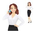 Elegant business woman talking on mobile phone