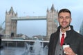 Elegant businessman around London Bridge Royalty Free Stock Photo