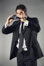 Elegant businessman with binocular