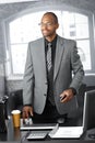 Elegant businessman at office desk