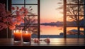 An elegant candle holder on a sill against the evening mountains.