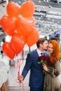 Elegant caucasian man in tuxedo and redhaired lady in dress Royalty Free Stock Photo