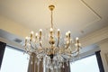 Elegant chandelier on the ceiling in a luxury restaurant Royalty Free Stock Photo