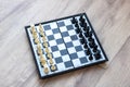 An elegant chess board featuring white and black pieces positioned on it Royalty Free Stock Photo