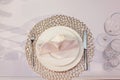 Elegant and chic gold and white table setting. selective focus