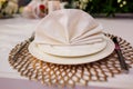 Elegant and chic gold and white table setting. selective focus