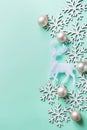 Elegant Christmas New Year Greeting Card Poster White Reindeer Snow Flakes Ball on Light Turquoise Blue Background. Copy Space Royalty Free Stock Photo