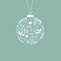 Elegant Christmas New Year greeting card with Xmas tree bauble with floral ornament hanging on string on turquoise blue background Royalty Free Stock Photo