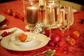 Elegant Christmas table setting in red and gold Royalty Free Stock Photo