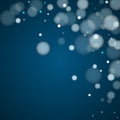 White abstract snowflakes over dark blue background. Royalty Free Stock Photo