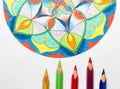 Elegant colorful mandala on the white background with the colorful pastels