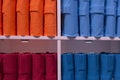 Elegant colorful polo shirts in strange pile on sale Royalty Free Stock Photo