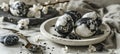 Elegant composition of black and white marble patterned easter eggs on white plate with copy space