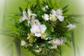 Luxury wedding bouquet on a green background. Elegant composition of roses. Close-up view of a vibrant flowers