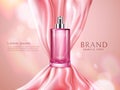 Elegant cosmetic advertising. Pink transparent spray bottle and shiny silk fabric isolated on bokeh background. Silky
