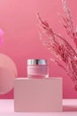 Elegant Cosmetic Jar with Pink Pampas Grass on Pastel Background