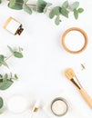Elegant Cosmetic Still Life with Eucalyptus on White Background Flat Lay Royalty Free Stock Photo