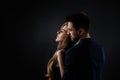 Elegant couple on black background. Royalty Free Stock Photo