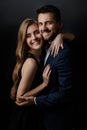 Elegant couple on black background. Royalty Free Stock Photo