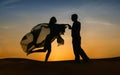 Elegant couple dancing at sunset Royalty Free Stock Photo