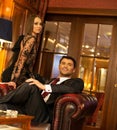 Elegant couple in luxury cabinet Royalty Free Stock Photo