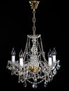 Elegant crystal strass chandelier with five lamps.