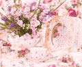 Elegant cups, flowers and retro frame