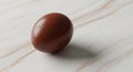 Elegant Dark Brown Egg on White Marble Surface Royalty Free Stock Photo